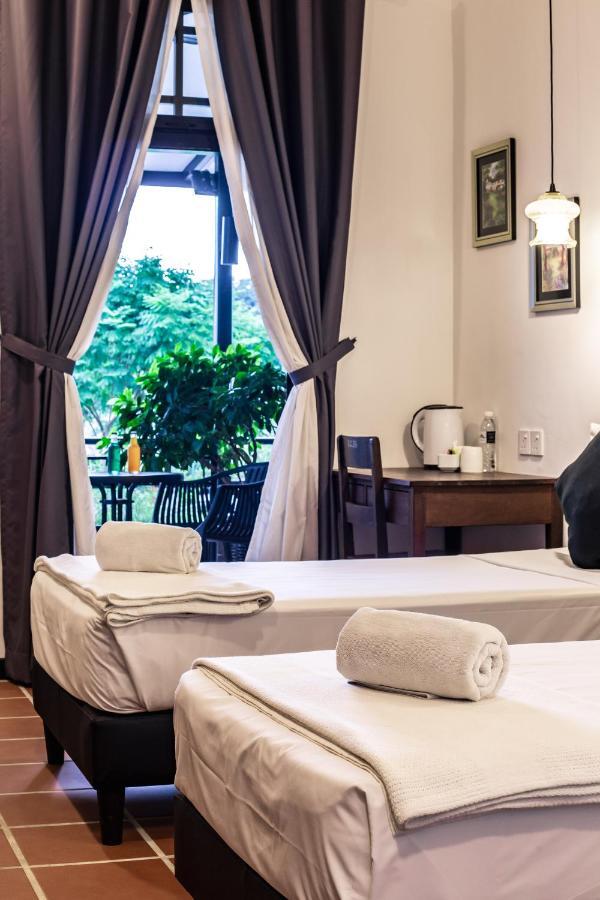 The Marian Boutique Lodging House Kuching Extérieur photo